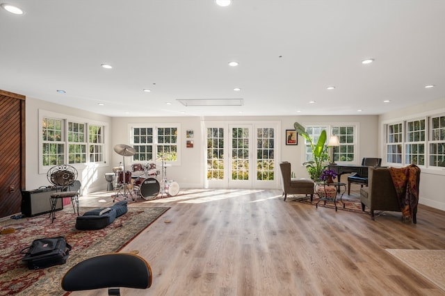 workout room with light wood-type flooring