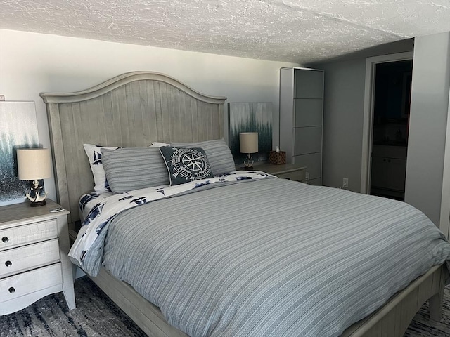 bedroom featuring a textured ceiling