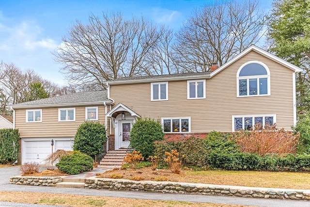 view of front of property with a garage