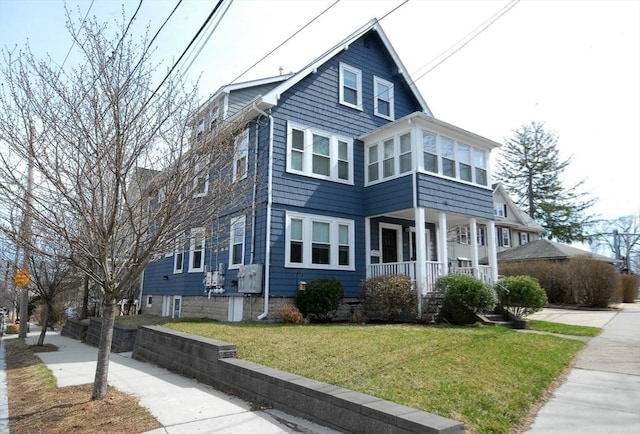 20 Beechwood Ave Unit B, Watertown, MA 02472 - view of front of house with covered porch and a front lawn