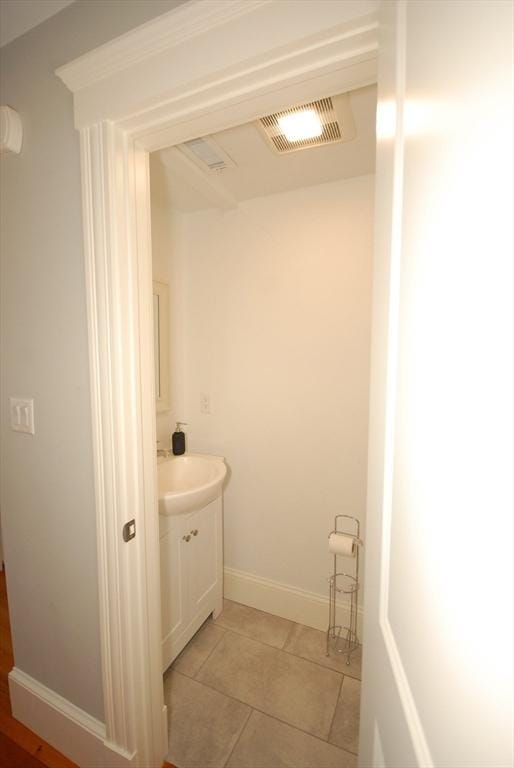 20 Beechwood Ave Unit B, Watertown, MA 02472 - bathroom featuring vanity, baseboards, and tile patterned flooring
