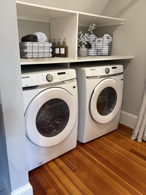 20 Beechwood Ave Unit B, Watertown, MA 02472 - washroom with washing machine and clothes dryer, wood finished floors, and baseboards