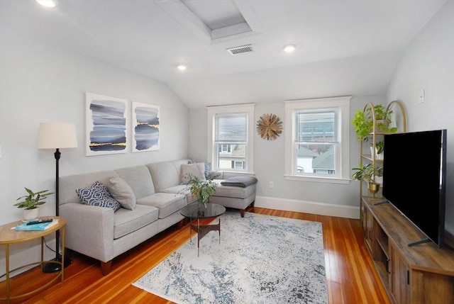 20 Beechwood Ave Unit B, Watertown, MA 02472 - living area with vaulted ceiling, wood finished floors, baseboards, and recessed lighting