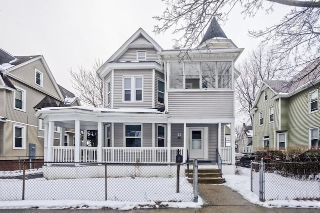 victorian-style house with a porch