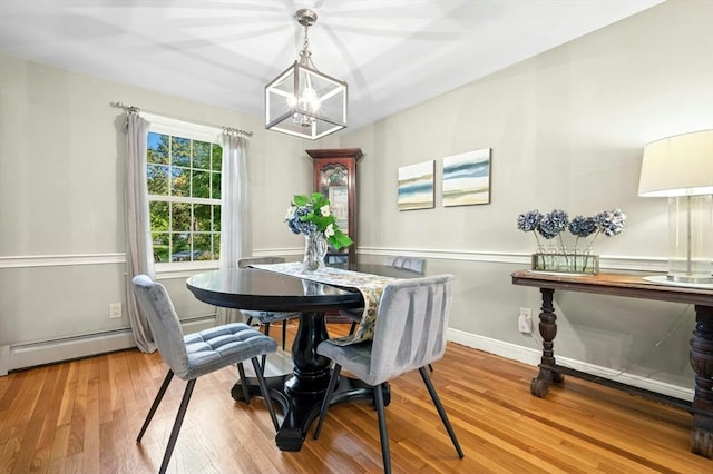 30 Eastview Rd, Hopkinton, MA 01748 - dining area featuring a chandelier, wood finished floors, and a baseboard radiator