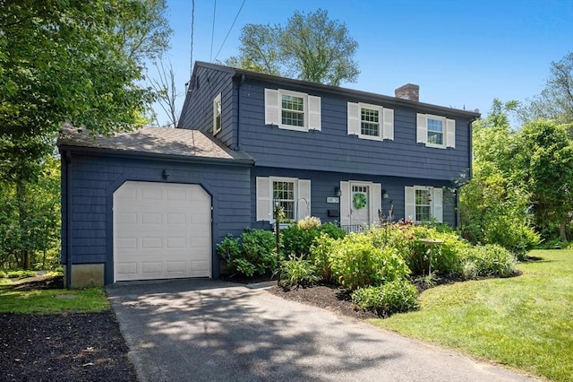 30 Eastview Rd, Hopkinton, MA 01748 - colonial inspired home with a chimney, an attached garage, asphalt driveway, and a front lawn