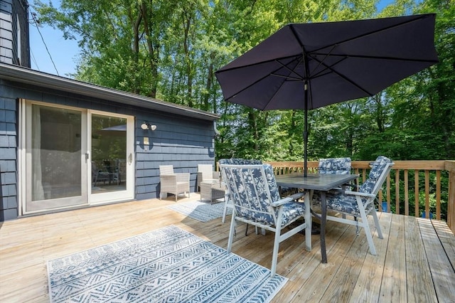30 Eastview Rd, Hopkinton, MA 01748 - wooden deck featuring outdoor dining space and view of scattered trees