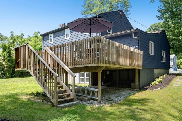 30 Eastview Rd, Hopkinton, MA 01748 - back of property with a wooden deck, a yard, stairway, and a chimney