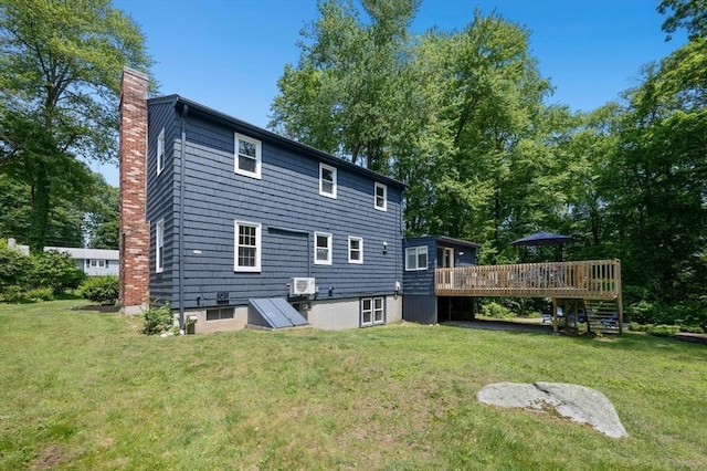 30 Eastview Rd, Hopkinton, MA 01748 - rear view of property with a chimney, a deck, and a lawn