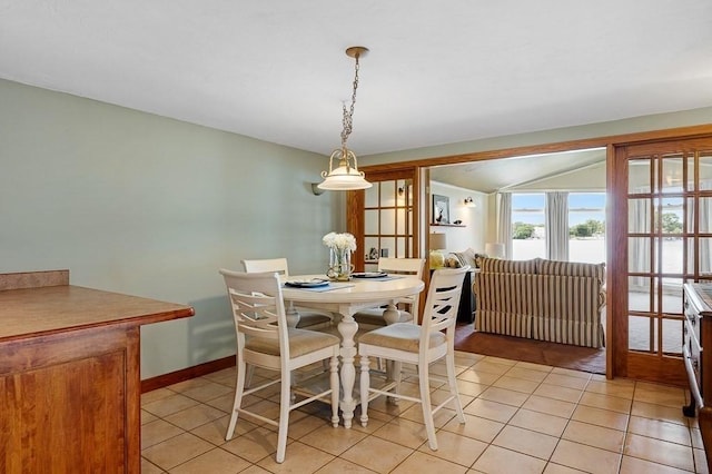 45 Point Pleasant Rd, Webster, MA 01570 - dining space with light tile patterned floors and lofted ceiling