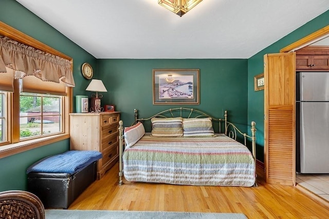 45 Point Pleasant Rd, Webster, MA 01570 - bedroom featuring freestanding refrigerator and wood finished floors