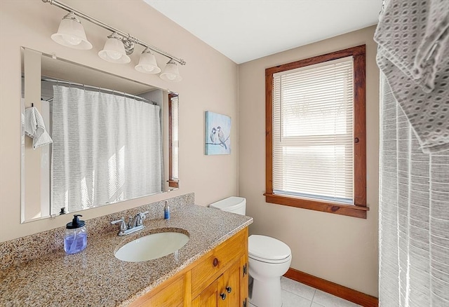 full bath with a shower with shower curtain, toilet, vanity, tile patterned flooring, and baseboards