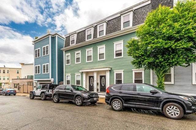 16 Emerson St Unit 1, Boston, MA 02127 - view of front of house featuring mansard roof and a shingled roof