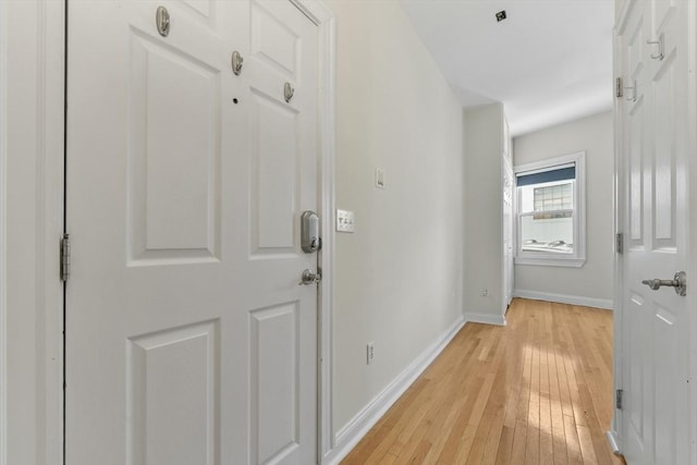 16 Emerson St Unit 1, Boston, MA 02127 - corridor featuring light wood finished floors and baseboards