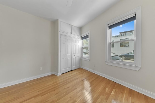 16 Emerson St Unit 1, Boston, MA 02127 - unfurnished bedroom featuring light wood-style flooring and a closet
