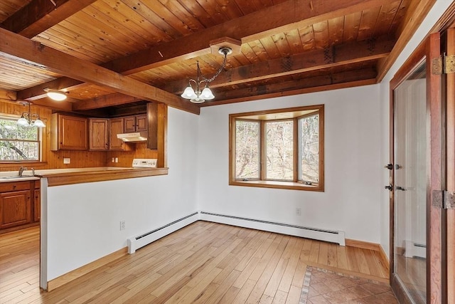 kitchen with a baseboard radiator, beamed ceiling, light wood-type flooring, and a chandelier
