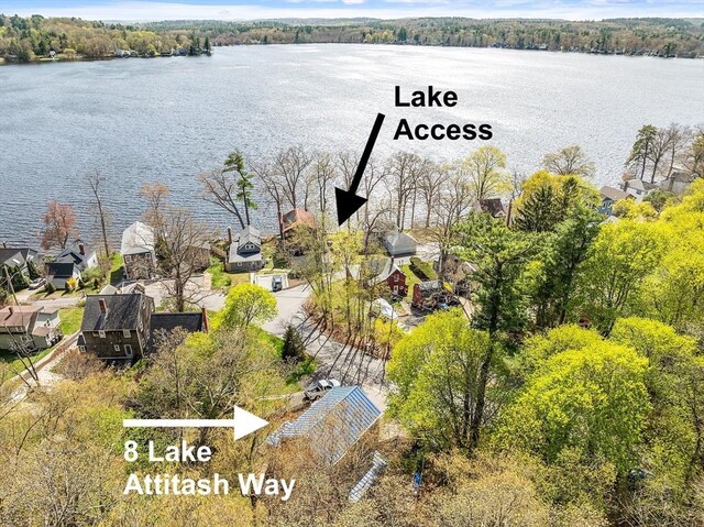 birds eye view of property featuring a residential view and a water view