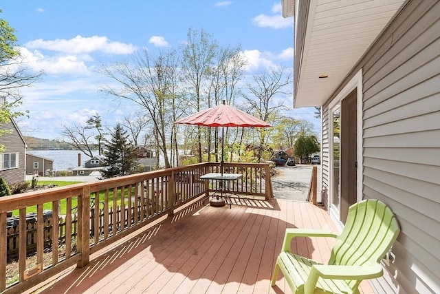 deck featuring a water view