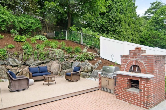 28 Ridge St, Arlington, MA 02474 - view of patio featuring outdoor lounge area and an outdoor kitchen
