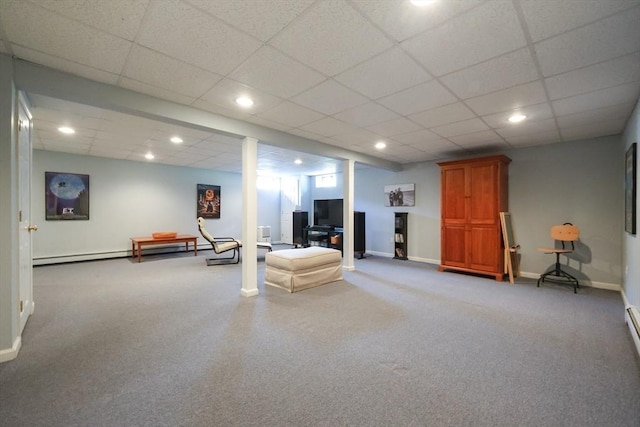 interior space featuring baseboards, recessed lighting, and a paneled ceiling