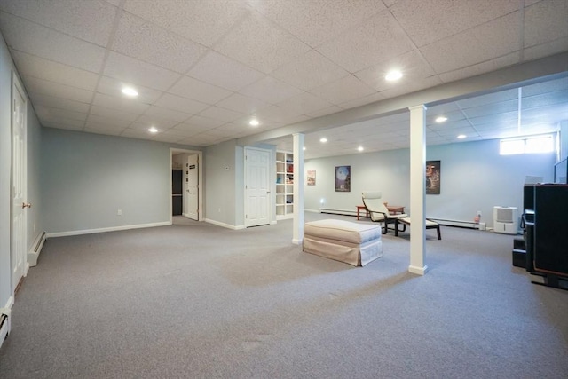basement with recessed lighting, baseboard heating, and carpet