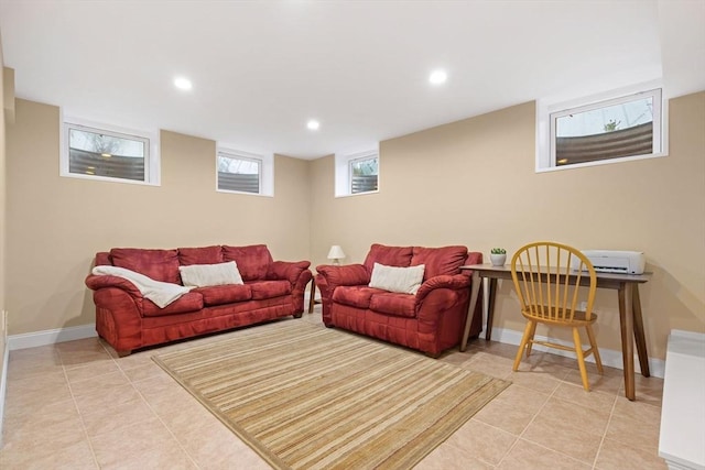 living area featuring recessed lighting, light tile patterned flooring, and baseboards