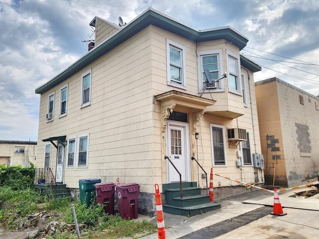 view of front of home with entry steps