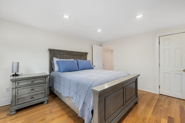 bedroom with light hardwood / wood-style flooring