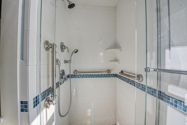 full bathroom featuring a stall shower