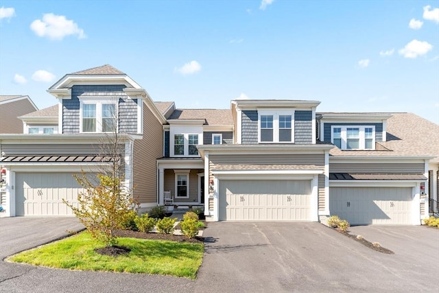 view of front of home with an attached garage and driveway