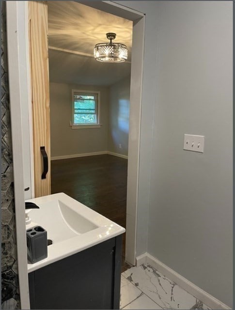 bathroom with vanity and tile floors