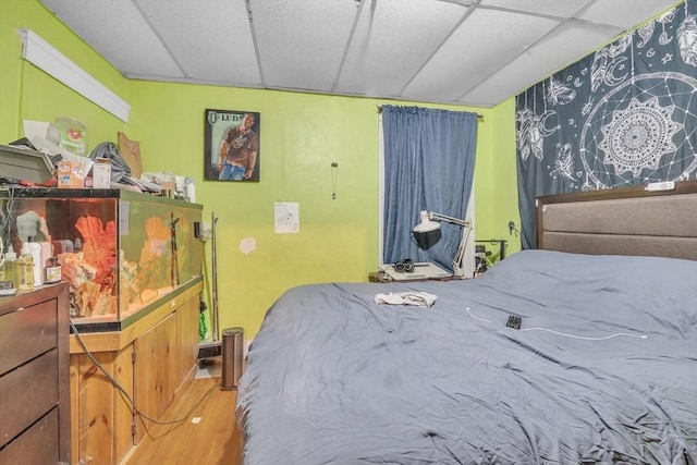 215 Beacon St, Worcester, MA 01610 - bedroom featuring a drop ceiling and wood finished floors