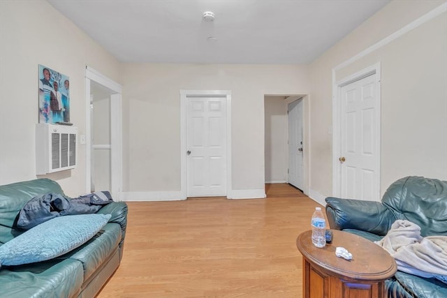 215 Beacon St, Worcester, MA 01610 - living area featuring light wood-type flooring and baseboards
