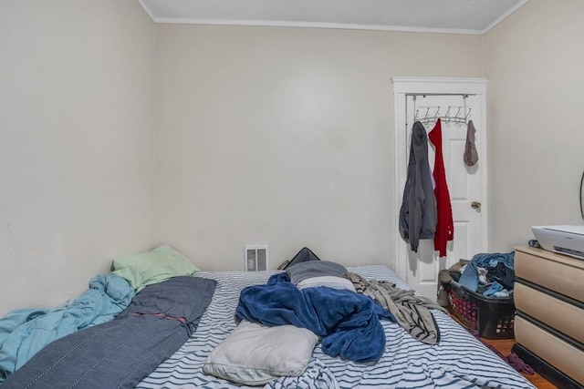 215 Beacon St, Worcester, MA 01610 - bedroom featuring ornamental molding and wood finished floors