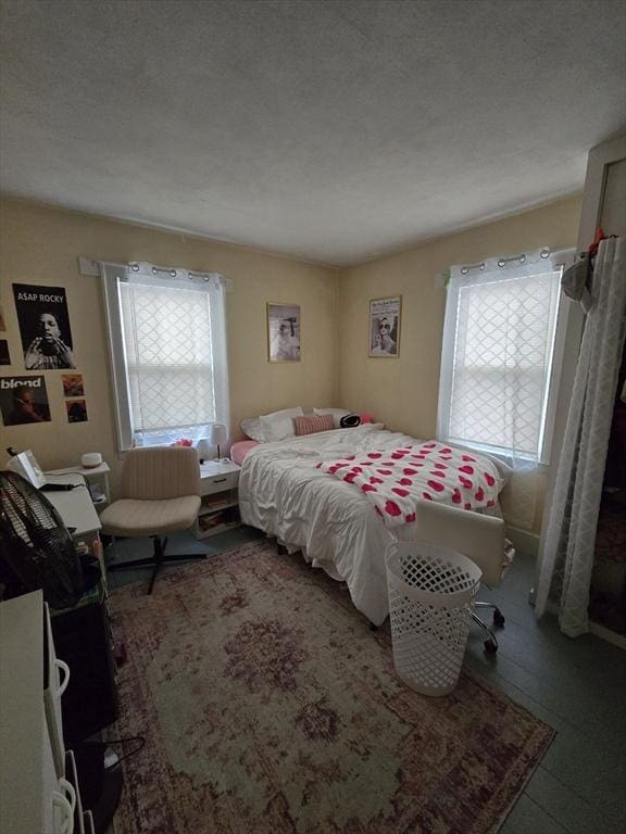 bedroom featuring multiple windows