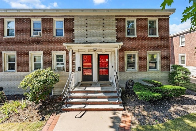 view of front of home with brick siding