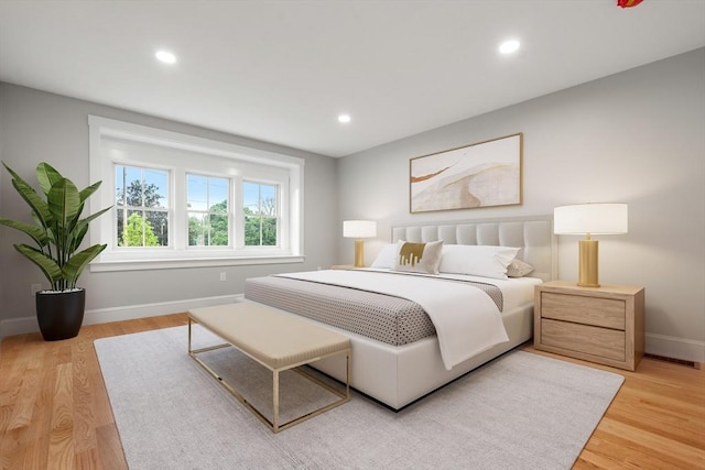 bedroom featuring light hardwood / wood-style floors