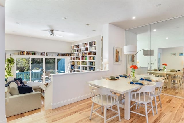 dining area with recessed lighting, a ceiling fan, and light wood finished floors