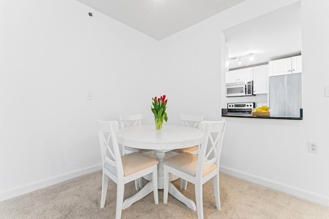 300 Allston Unit 205, Boston, MA 02135 - dining room with carpet floors and baseboards