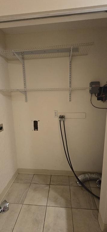 800 Bearses Way Unit 5Nb, Barnstable, MA 02601 - washroom featuring washer hookup and light tile patterned flooring