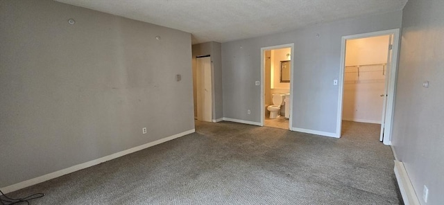 800 Bearses Way Unit 5Nb, Barnstable, MA 02601 - unfurnished bedroom featuring carpet, a walk in closet, a closet, and ensuite bathroom