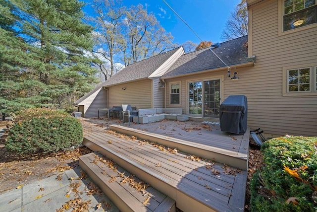 back of property with a wooden deck