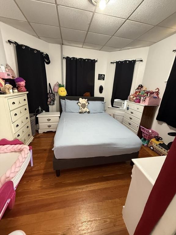 50 Proctor Ave, Revere, MA 02151 - bedroom with wood finished floors and a paneled ceiling