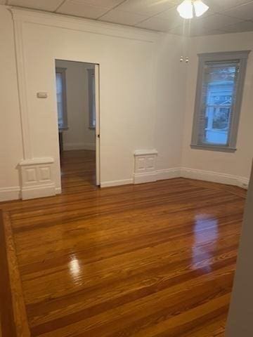 50 Proctor Ave, Revere, MA 02151 - empty room featuring baseboards, wood finished floors, and a ceiling fan