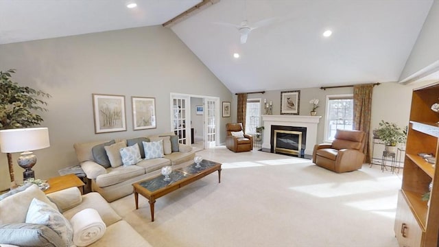 living room featuring ceiling fan, a baseboard heating unit, high vaulted ceiling, light carpet, and french doors