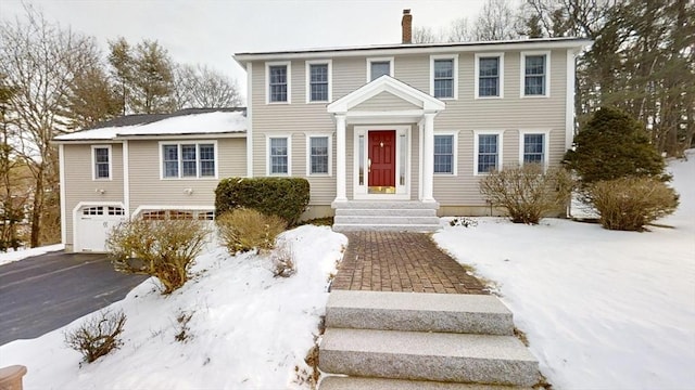 colonial-style house with a garage