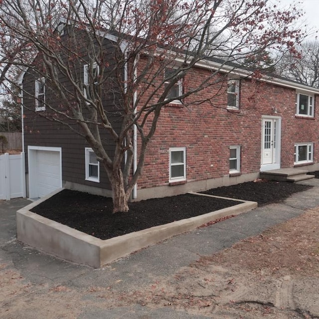 view of home's exterior featuring a garage