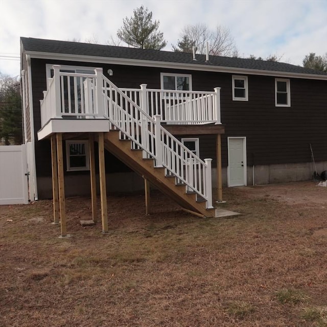 rear view of property with a deck