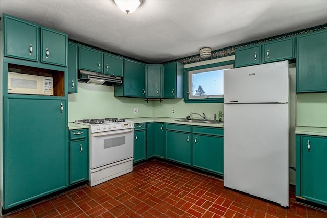 kitchen featuring a sink, green cabinetry, white appliances, brick floor, and under cabinet range hood