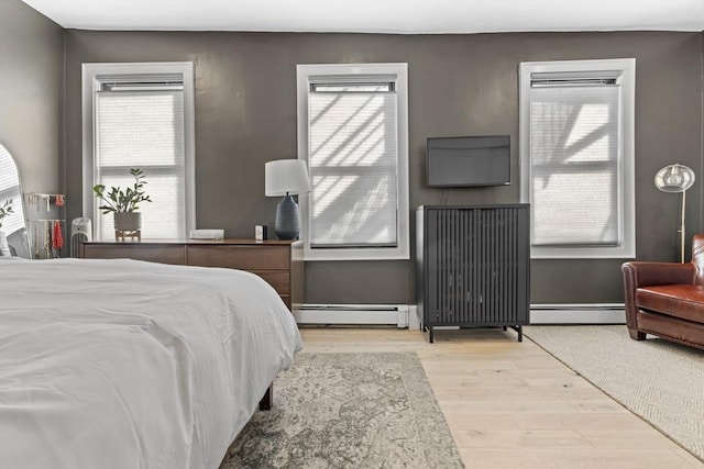 81 E Brookline St Unit 3, Boston, MA 02118 - bedroom featuring wood finished floors and baseboard heating